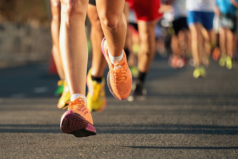 marathon running in the light of evening